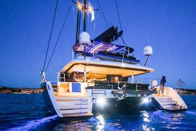 Nigel James Yacht Charter crewed catamaran CARPE DIEM at sunset