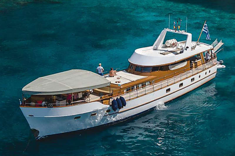 Classic 1950s gentleman's crewed charter motor yacht AMANDA in Greece
